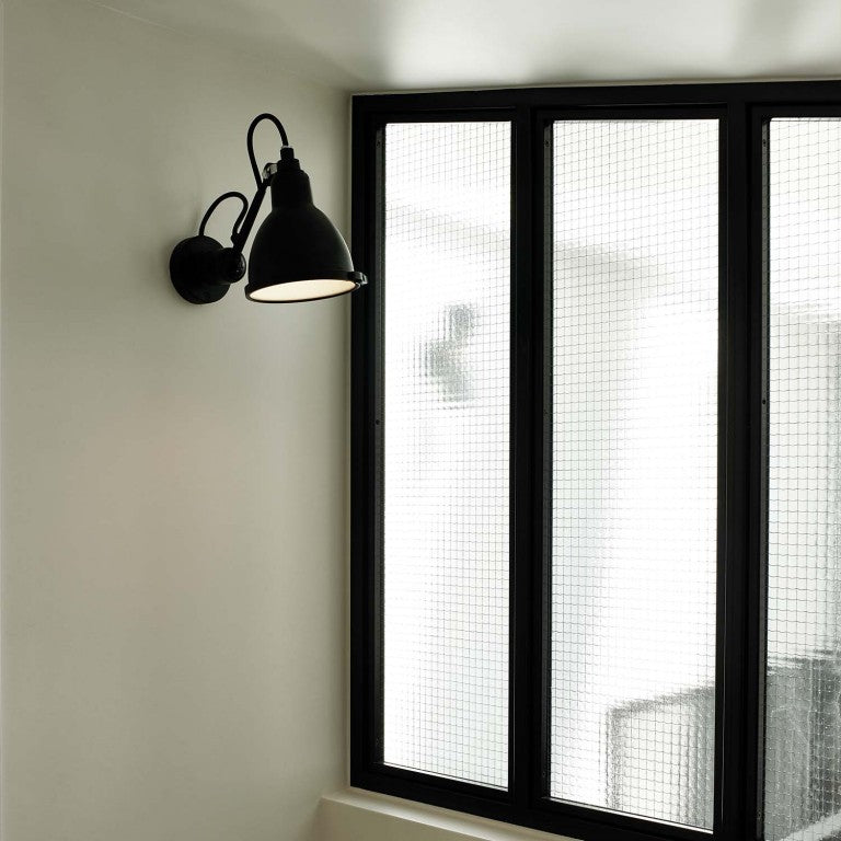DCW Editions Lampe Gras No.304 bathroom in Black next to window