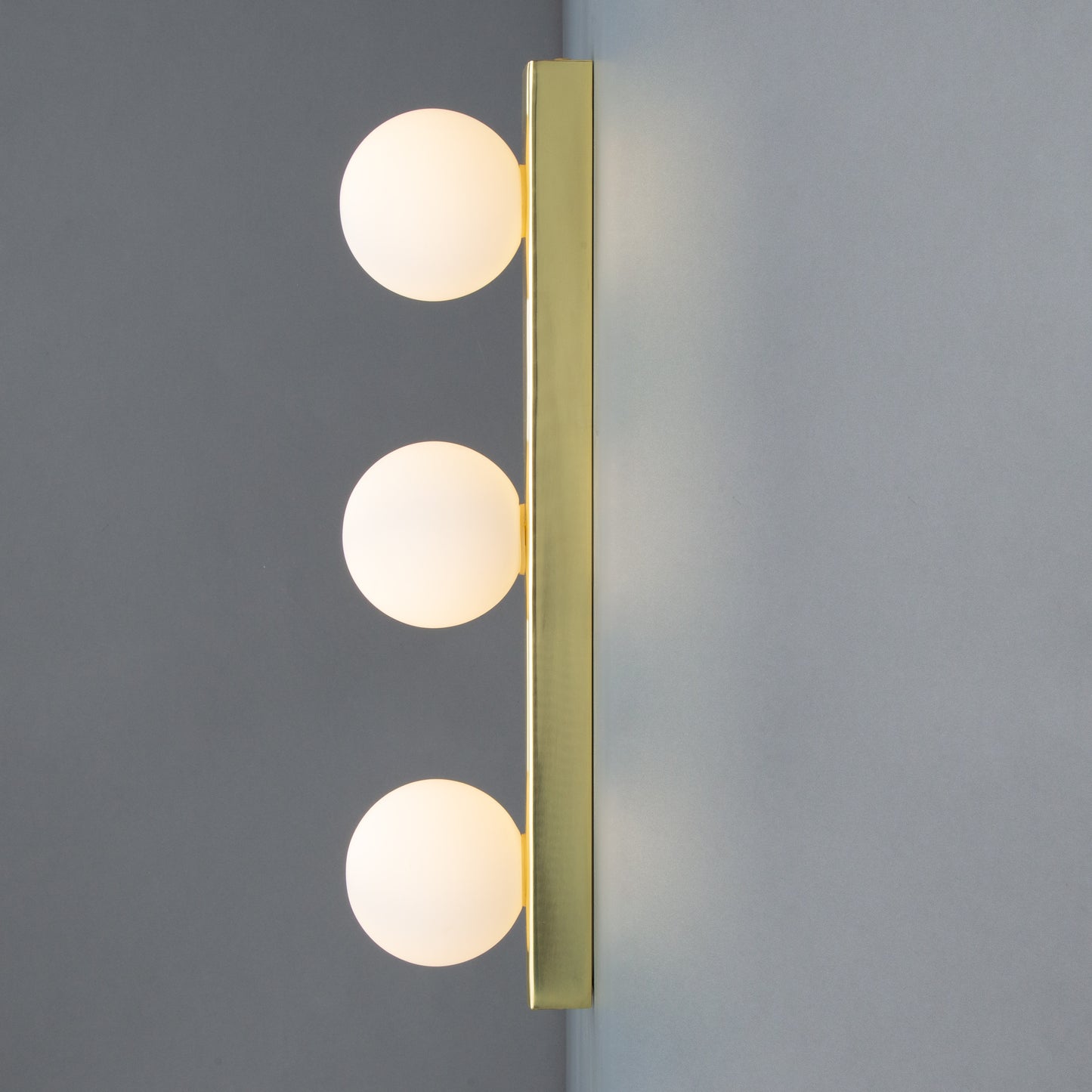 Noelani Bathroom Wall Light with Three Glass Globes IP44