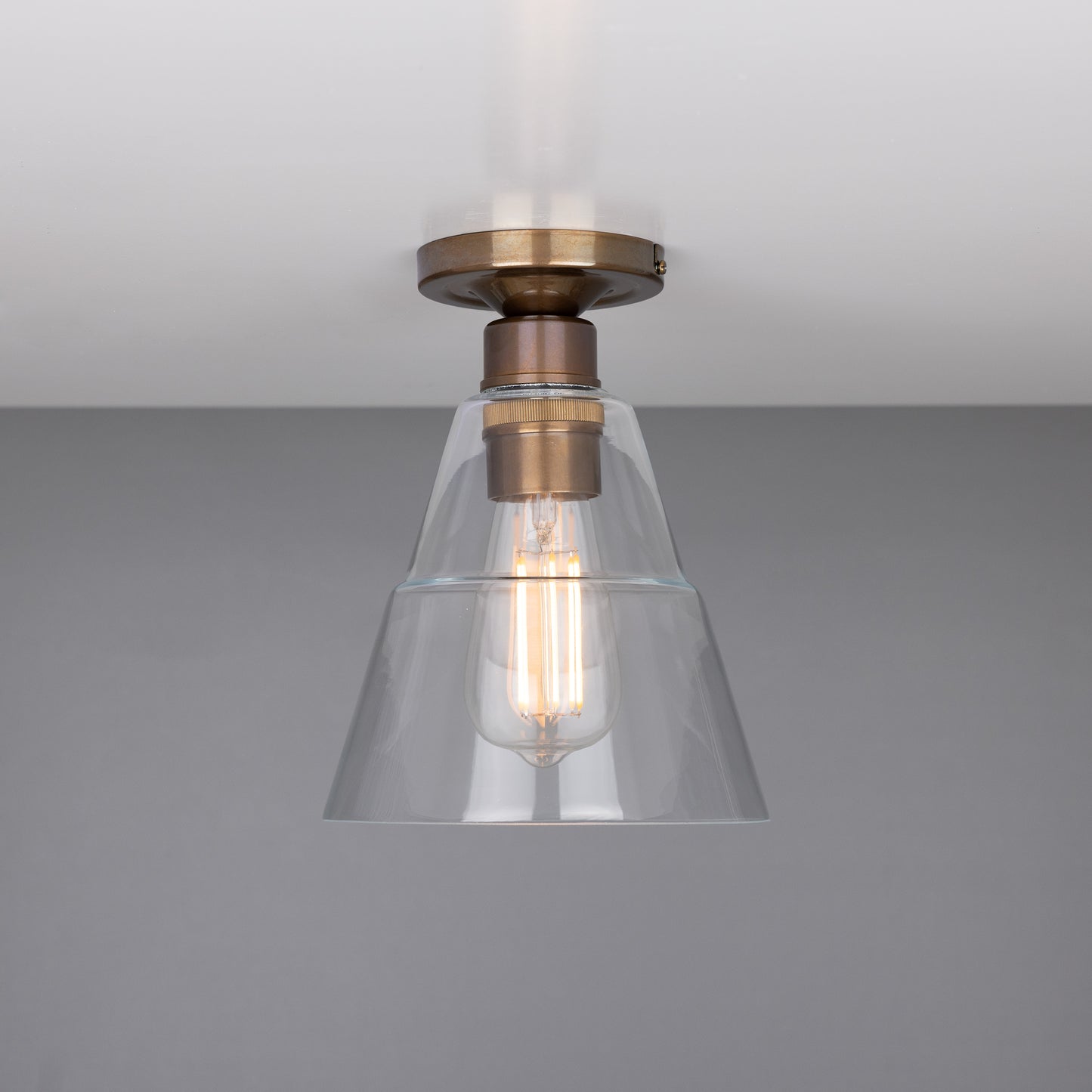 Rigale Flush Ceiling Light with Stepped Glass Lamp Shade