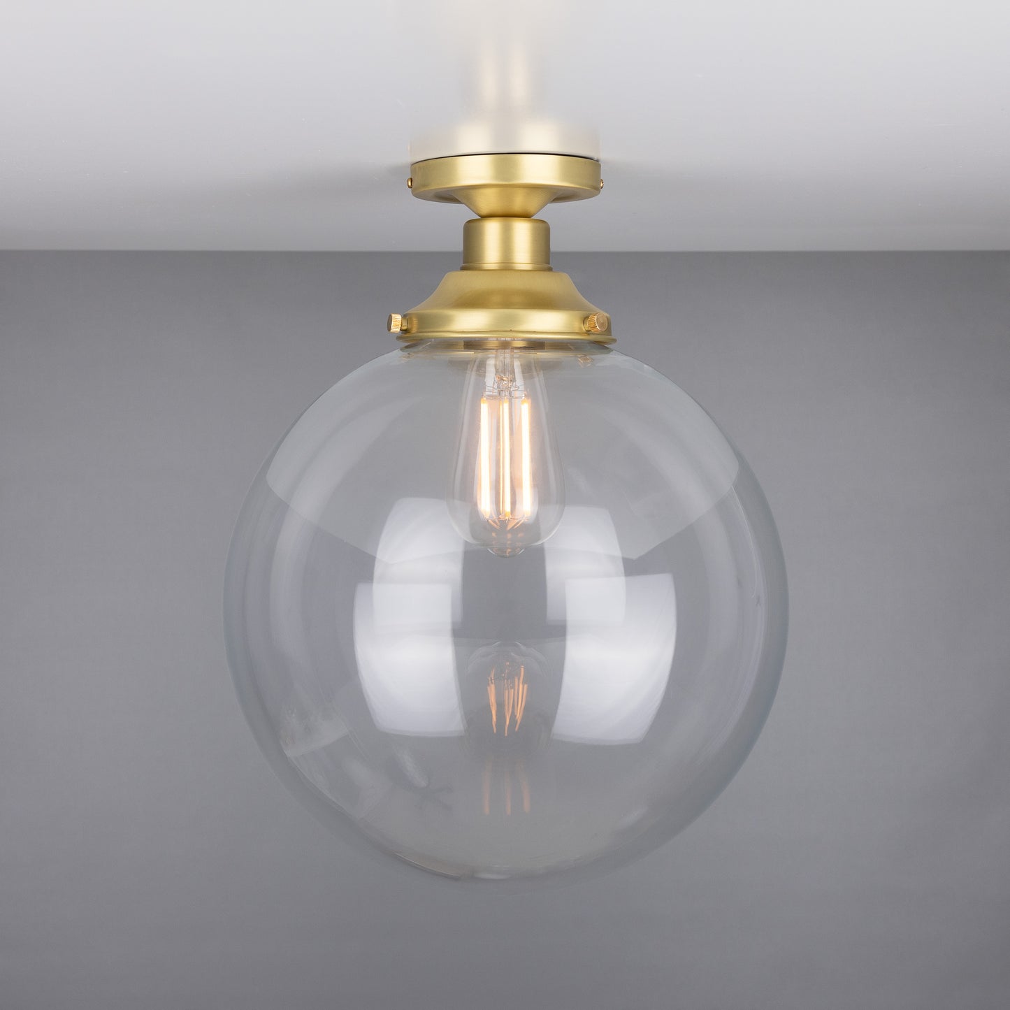 Riad Clear Glass Globe Flush Ceiling Light